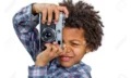 53049692-black-boy-learns-to-shoot-at-the-camera